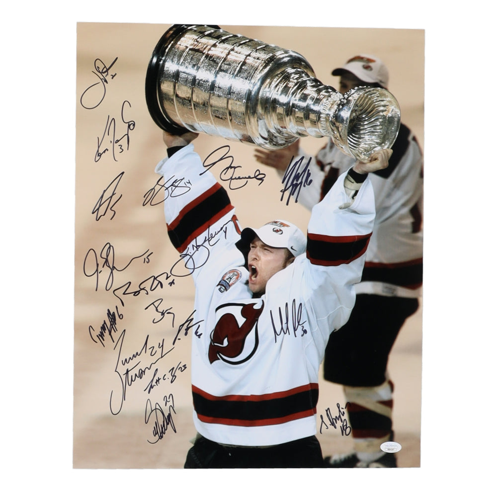 2002-03 Stanley Cup Champion Devils 16x20 (JSA) Photo Team-Signed by (17) with Martin Brodeur, Joe Nieuwendyk, Scott Stevens, Scott Niedermayer