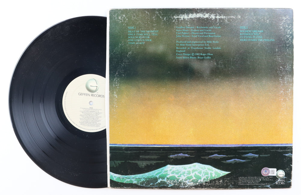 Steve Howe Signed (Beckett) Asia "Heat Of The Moment" Record Album Cover