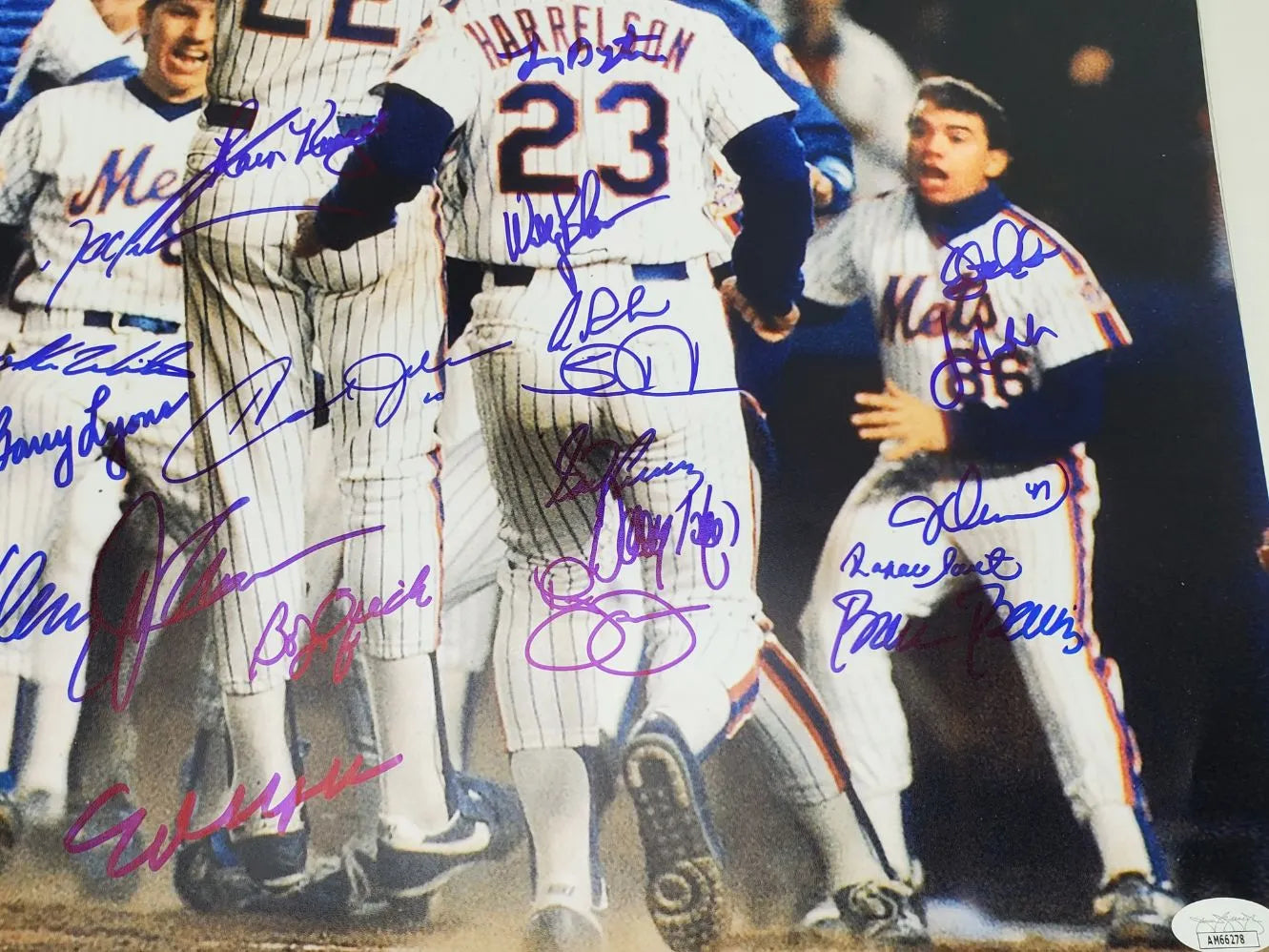 1986 Mets WS Champs Team Signed (JSA) – Doc Gooden, Darryl Strawberry, Ray Knight, Mookie Wilson & Others (26 Total) Signed 16×20 Photo (JSA COA)