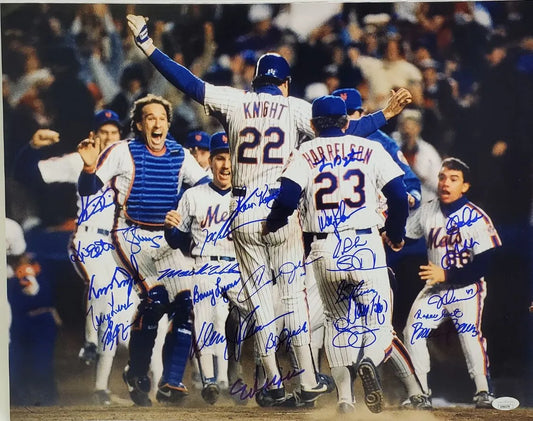 1986 Mets WS Champs Team Signed (JSA) – Doc Gooden, Darryl Strawberry, Ray Knight, Mookie Wilson & Others (26 Total) Signed 16×20 Photo (JSA COA)