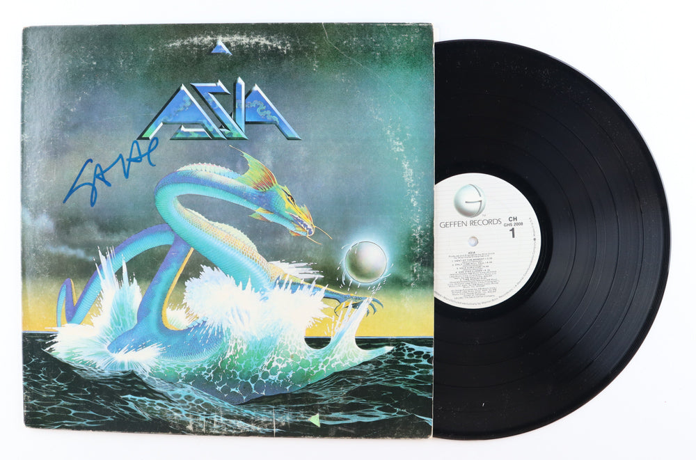 Steve Howe Signed (Beckett) Asia "Heat Of The Moment" Record Album Cover