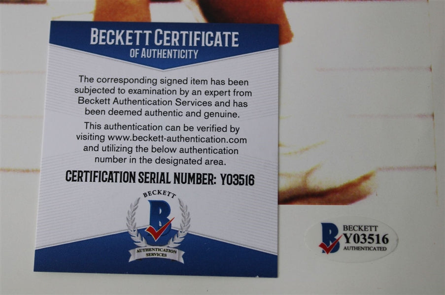 The Rock & Earl Hebner (WWF Referee) Dual Signed (Beckett COA) WWF 11x17 Photo