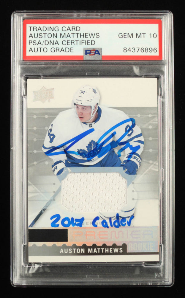 Auston Matthews Signed 2016-17 Upper Deck Premier Rookies Jerseys #R50 Inscribed "2017 Calder" - Rookie Card | Autograph Graded PSA 10